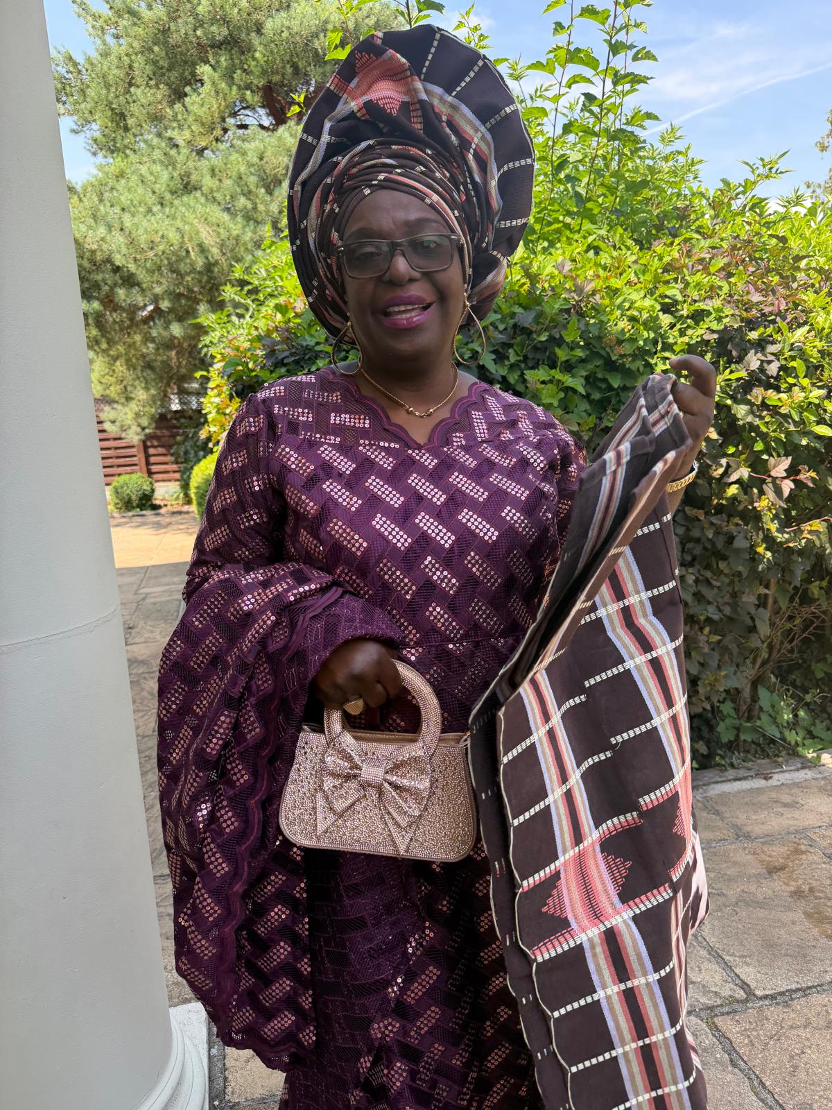 Guest in aso-ebi at the venue — Love & Tyron wedding
