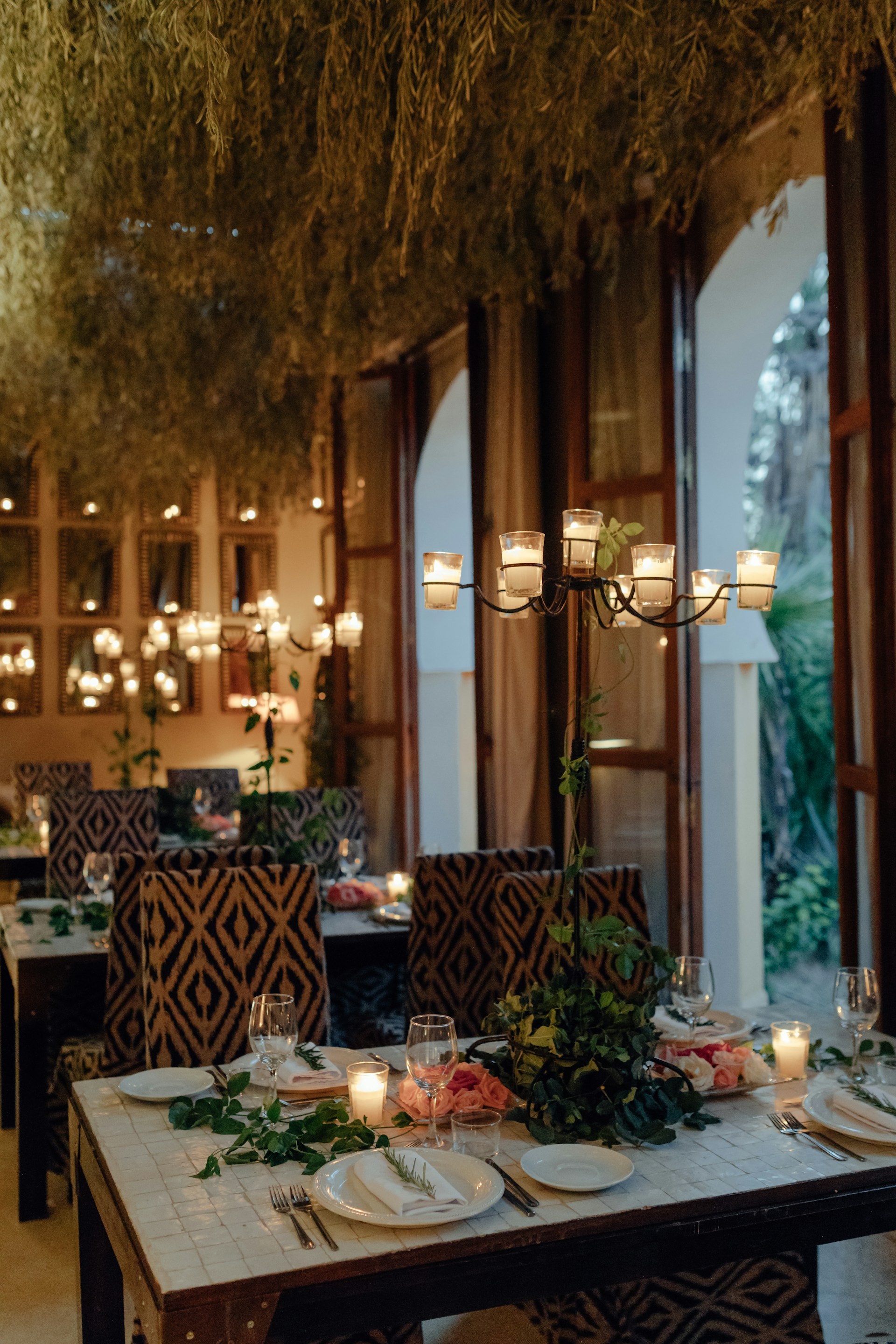 Candlelit dinner with floral arrangements